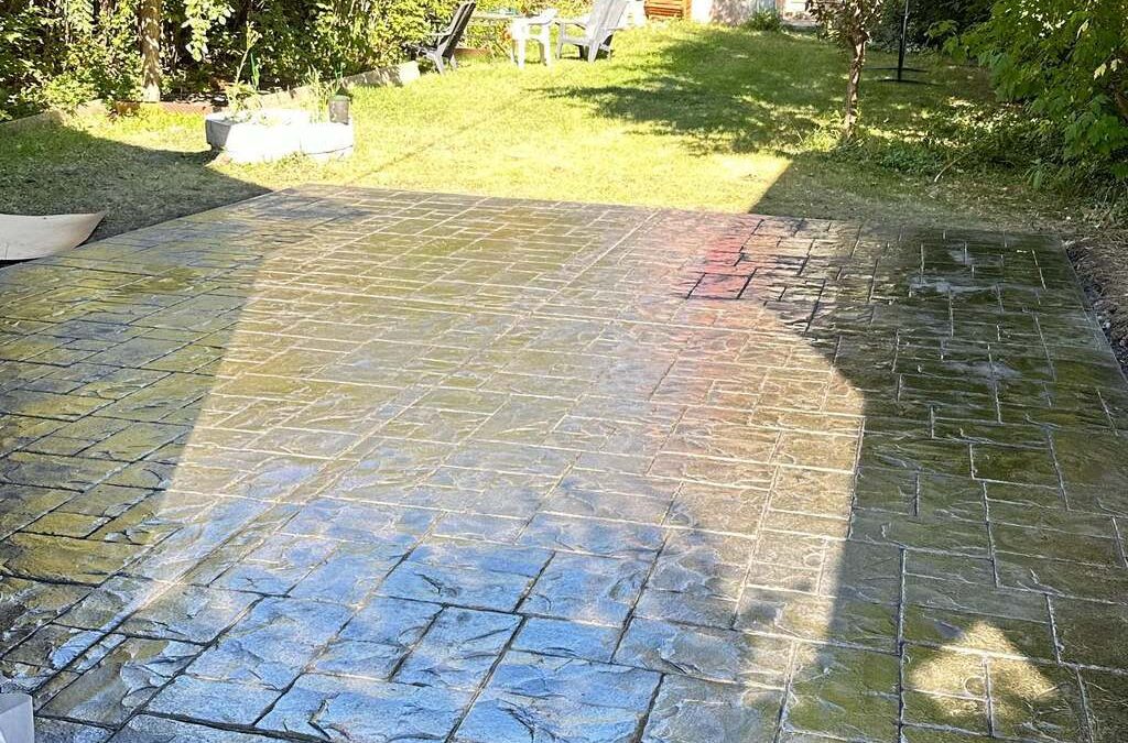 Stamped concrete Patio sealed with patio stone design